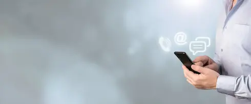 stock-photo-contact-us-businessman-hand-holding-smart-phone-with-icon-mobile-phone-mail-telepho