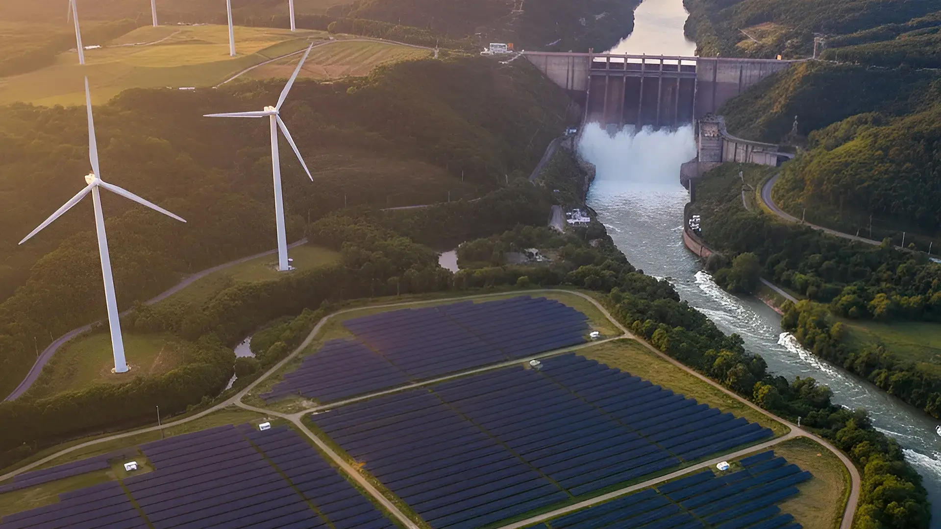 Infraestructura de energia renovable con paneles solares y presa hidroelectrica.