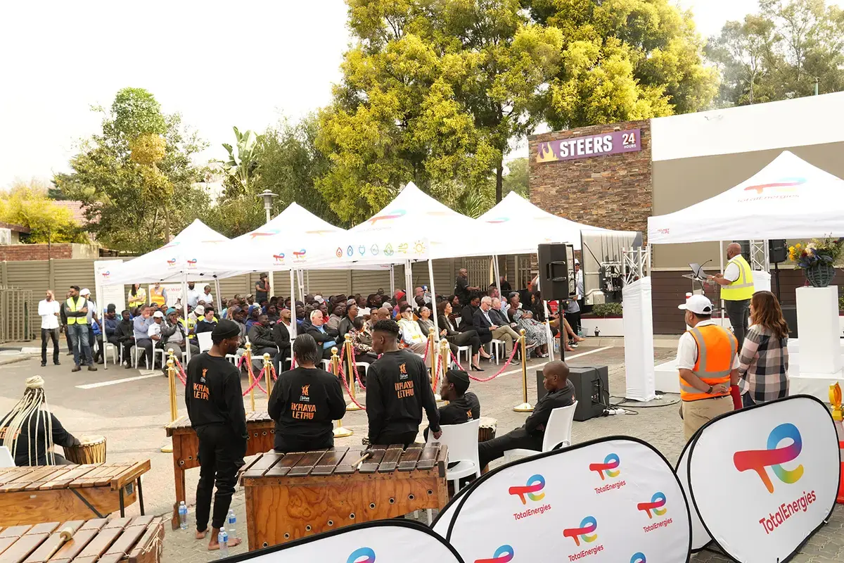 helmets handing out at the TotalEnergies Senderwood service station in Johannesburg - see description hereafter