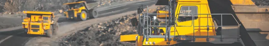 heavy-duty vehicles at a mining site