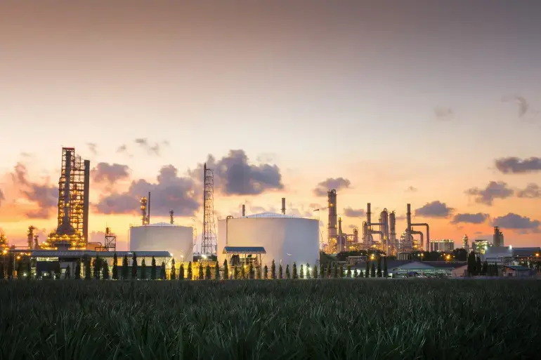 Natural gas storage tanks and oil tank in industrial plant