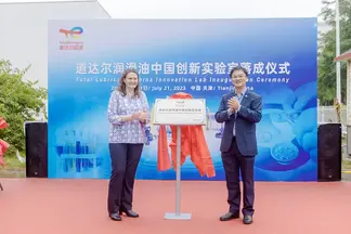 Ting Wee and Anne-Solange on stage at Total Lubricants China Innovation Lab inauguration ceremony