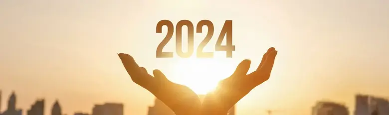 2024 in hands with sunset