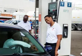 general_trade_manager_bertha_amissah_interacting_with_a_customer.jpg
