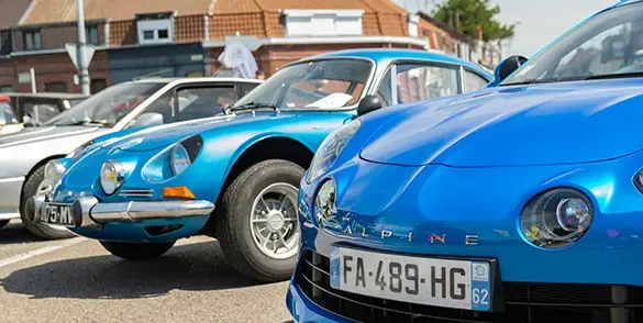 3 cars parked side by side