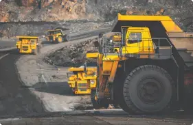 heavy-duty vehicles at a mining site