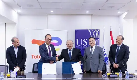 signing ceremony between TotalEnergies Marketing Lebanon and Saint Joseph University of Beirut (USJ) to transform two of the university campuses into solar-powered hubs