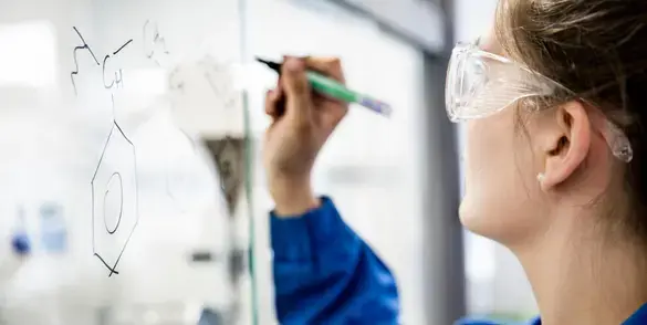 Chemical formula written on a board