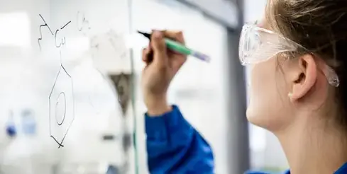 Chemical formula written on a board