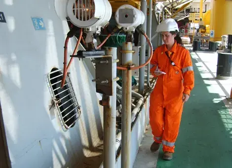 Mireille at the start of her career performing technical checks onboard