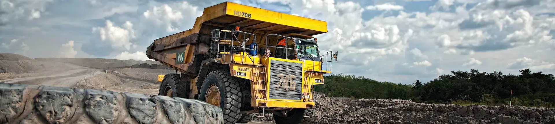 yellow truck on a coal mine