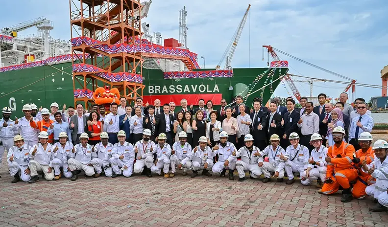 Group photo of employees for the naming of Brassavola ceremony