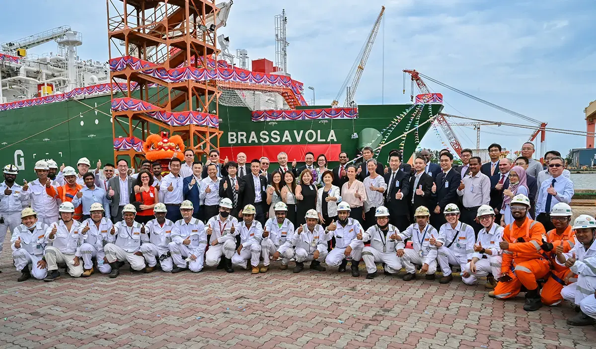 Group photo of employees for the naming of Brassavola ceremony