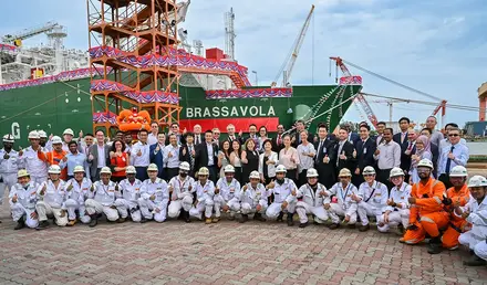 Group photo of employees for the naming of Brassavola ceremony