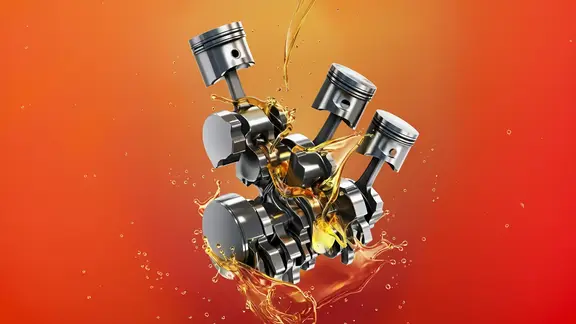 Aceite lubricando los pistones de un motor.