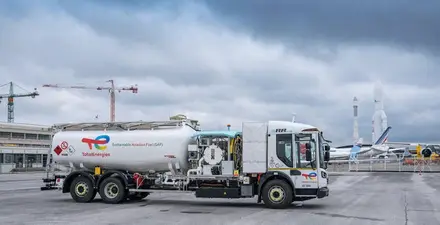 TotalEnergies sustainable aviation fuel truck at an airport