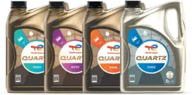 Quartz 3000, 4000, 5000 and 7000 car engine oil bottles