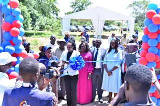ribbon_cutting_at_a_resettlement_house.jpg